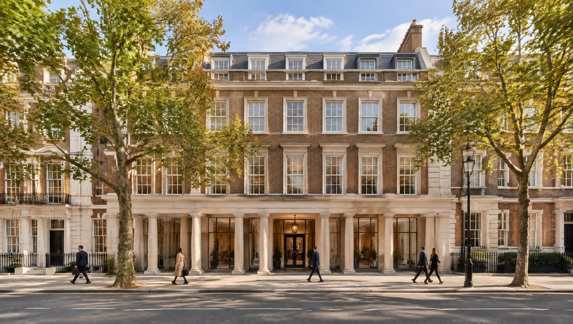 Refurbished London office building with a Portland stone colonnade and plane trees